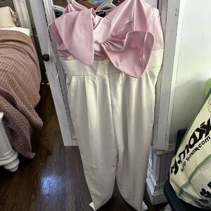 Express bow one piece pant suit with pockets!